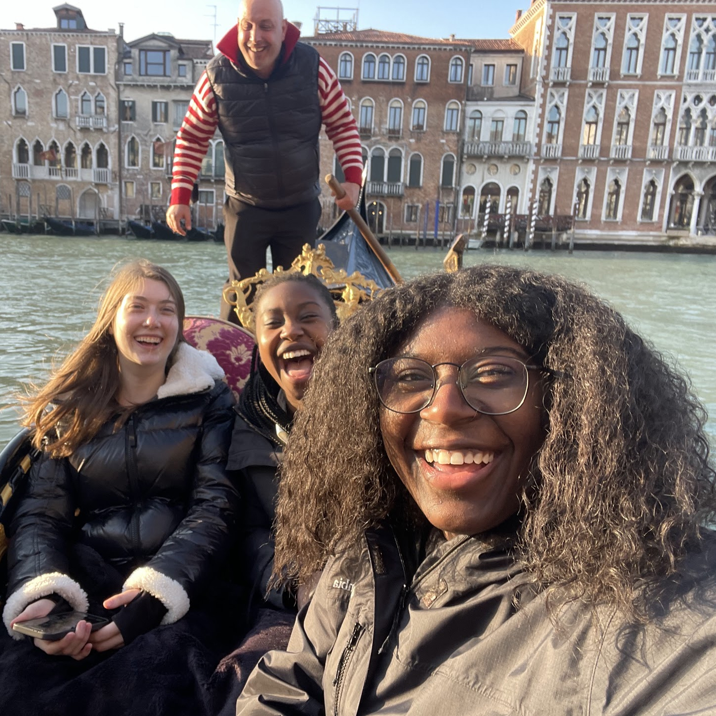 Elon student Nijah Rollins shares a boat ride with her classmates during a semester studying abroad and completing an Elon internship. Through the five Elon Experiences, the university's signature program, participate in several experiential learning opportunities.