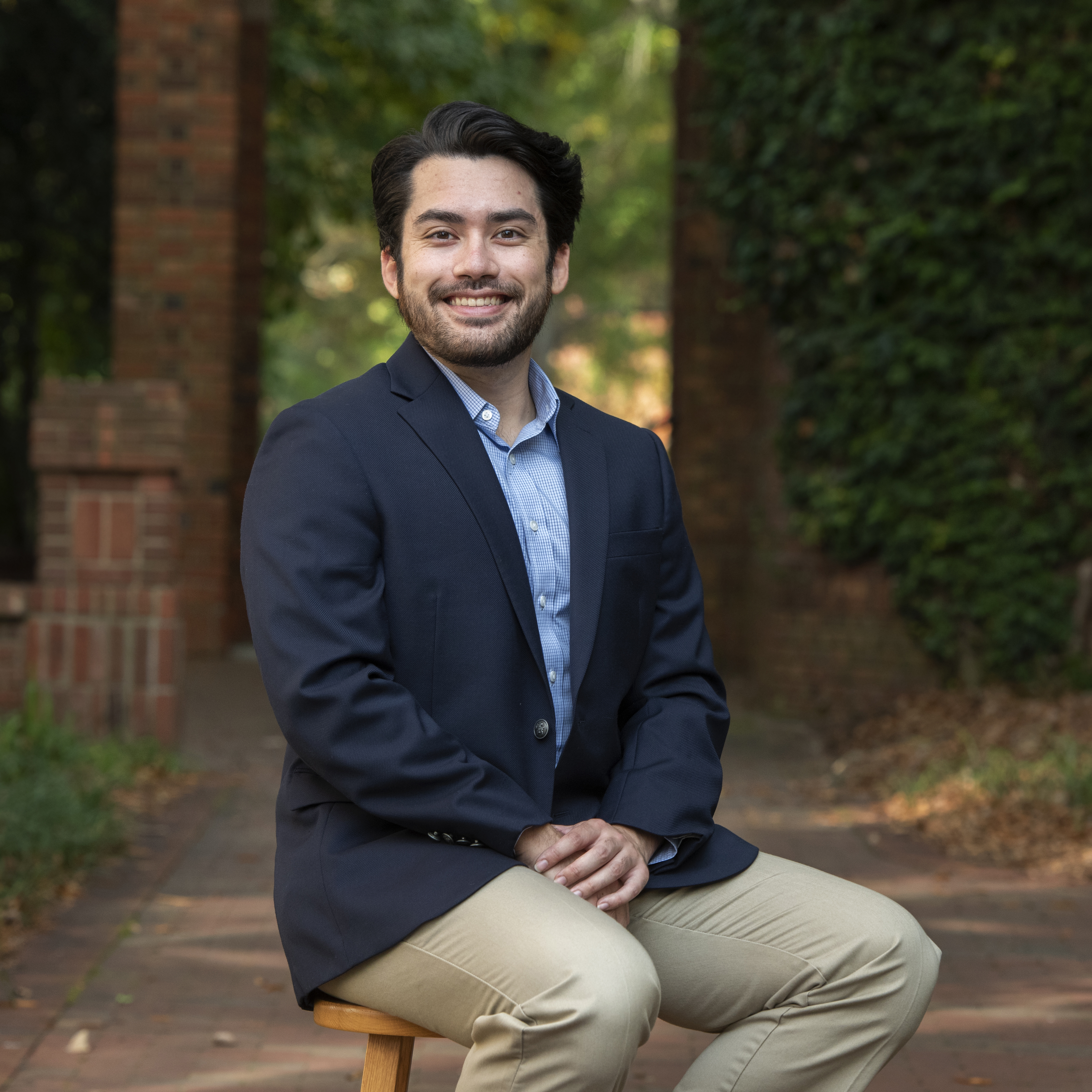 Lumen Scholar Kevin Scott poses for a portrait. By delving into an undergraduate research project, Kevin took advantage of one of the many experiential learning opportunities offered at Elon.