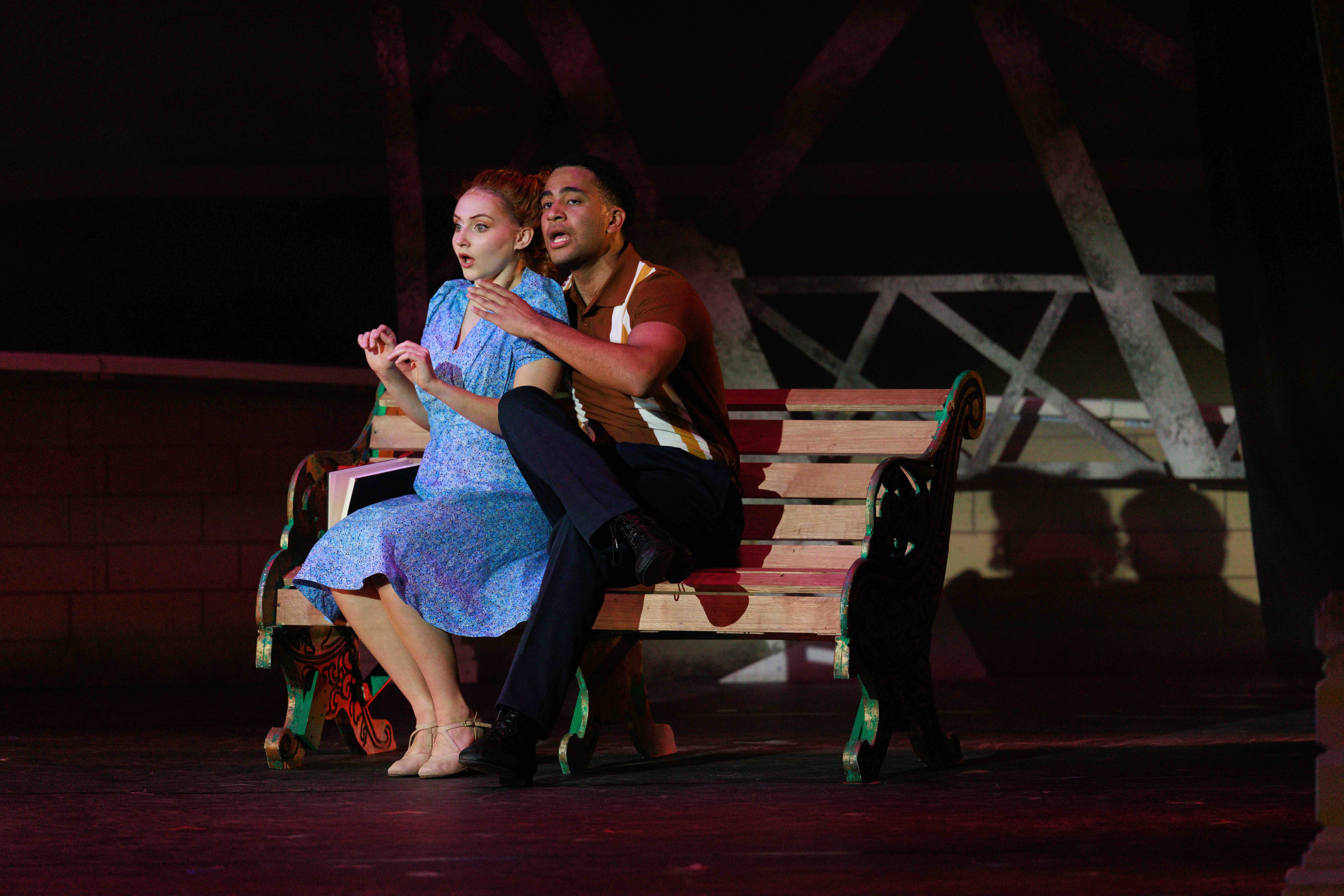Two students perform together in a production of "American in Paris."