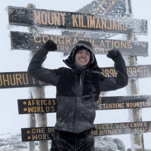 Haydn Stucker at the top of Mount Kilimanjaro
