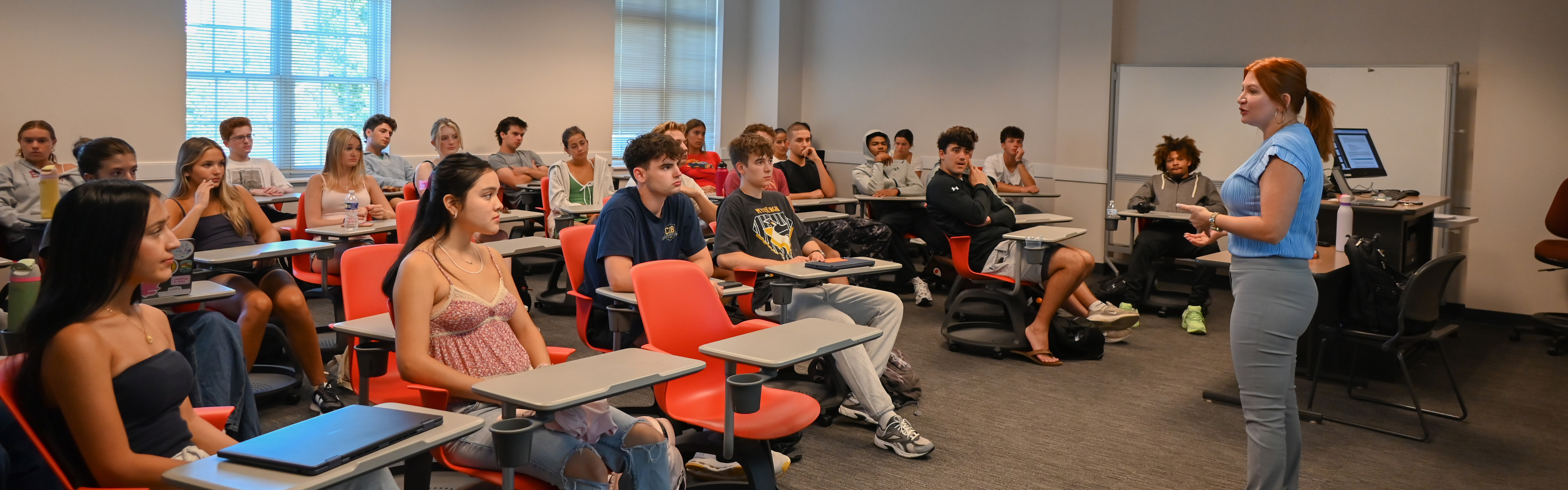Professor Devon Hawkins teaching on the second day of classes