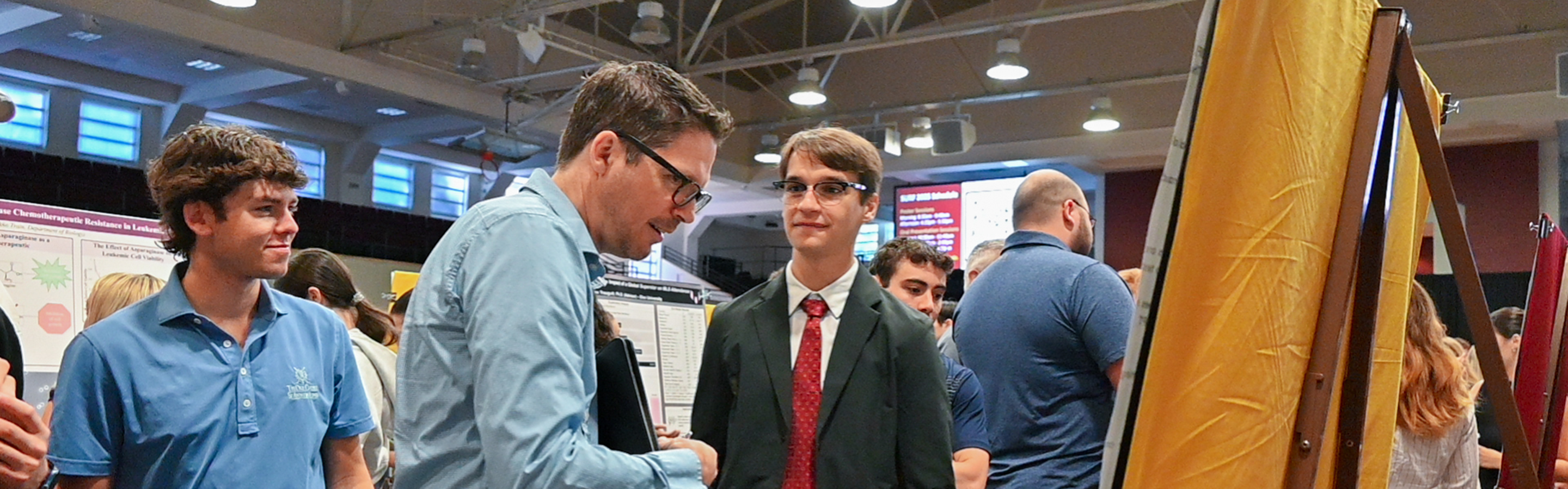 Econ Professor looking at work on SURF day