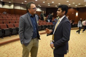 Dr. Manoj Chari talks with Tarun Mohan Lal in LaRose Digital Theatre at Elon University.