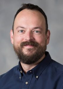 Headshot of Kevin Bourque, assistant professor of English