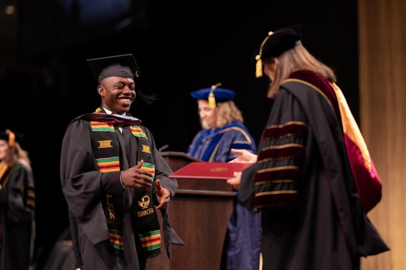 Photo of graduate students at commencent