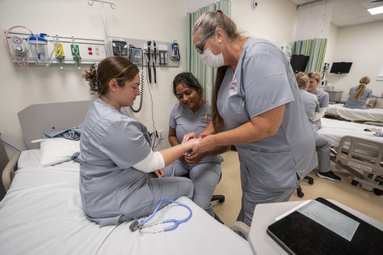 A couple of nurses complete class work as part of Elon's Accelerated Bachelor of Science program.