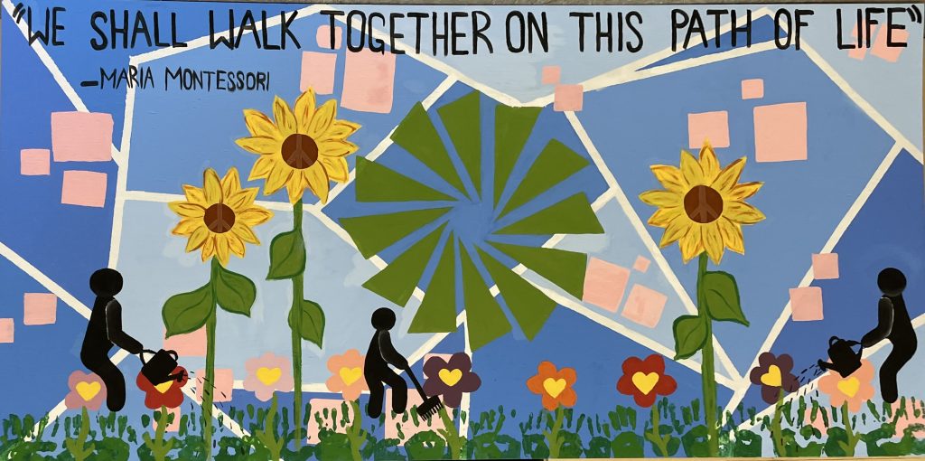 Vibrant garden mural at Greensboro Montessori. Jolie Patten's '25 internship evolved into a collaborative project with 4th and 5th graders that brought art, community, and nature together.