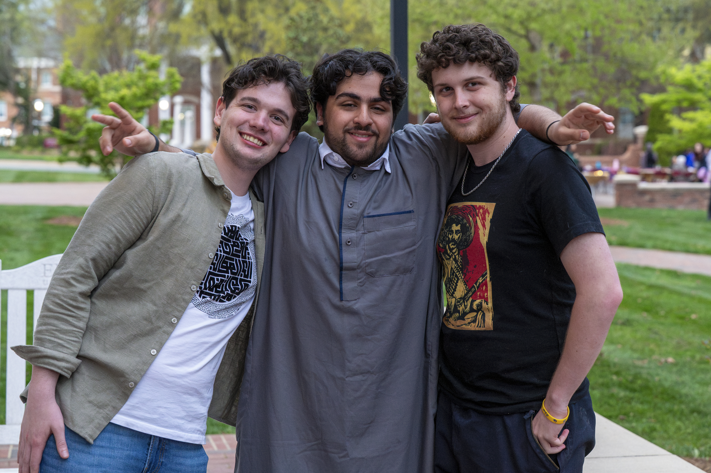 A group of students enjoying the fresh air and food.