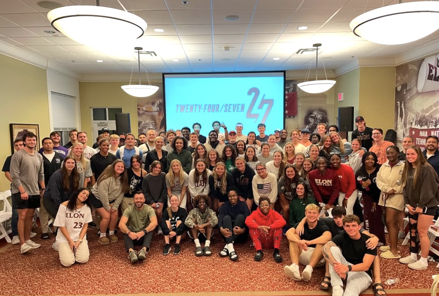 A large group of students gathered together.