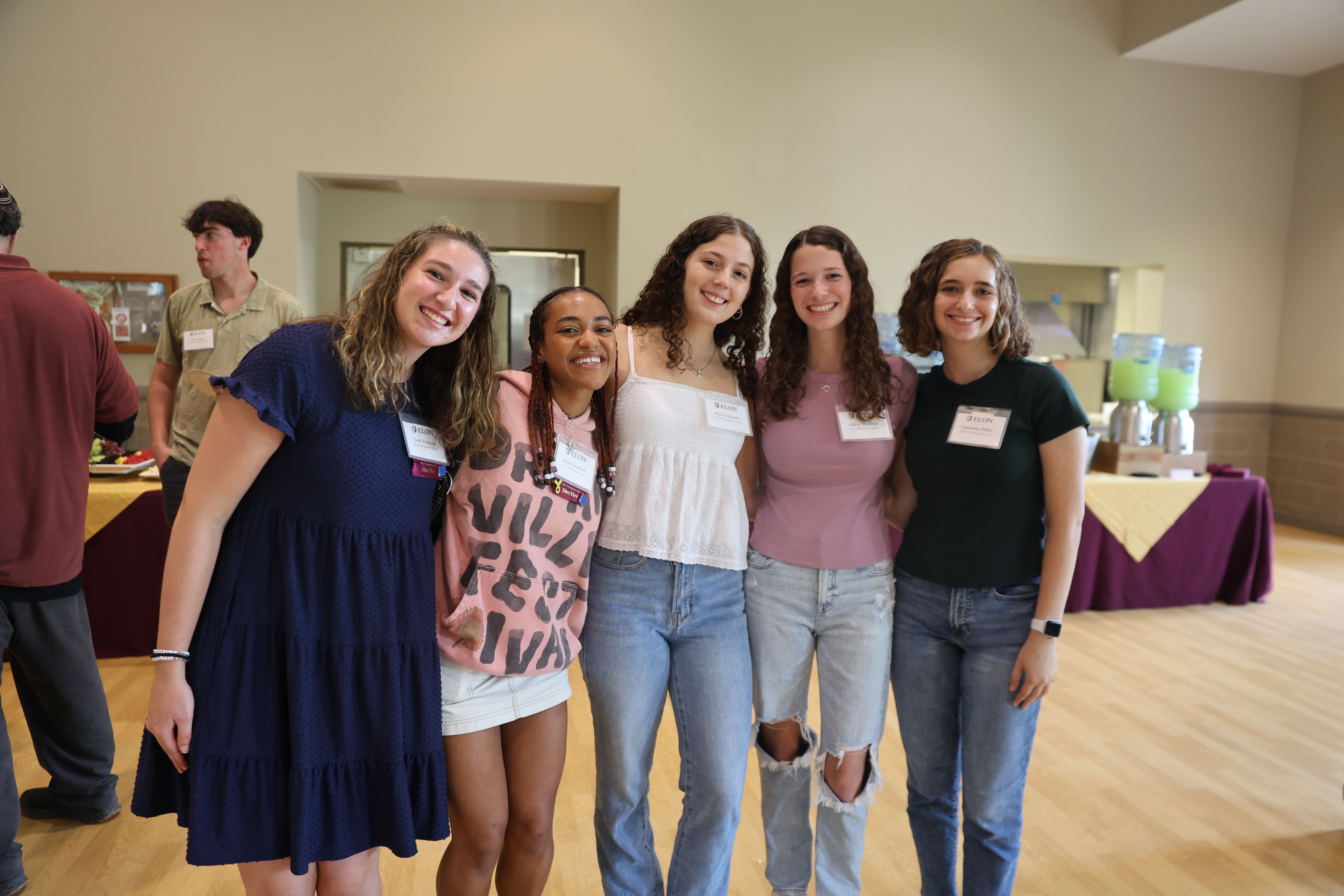 A group of Jewish life students ready to welcome guests.