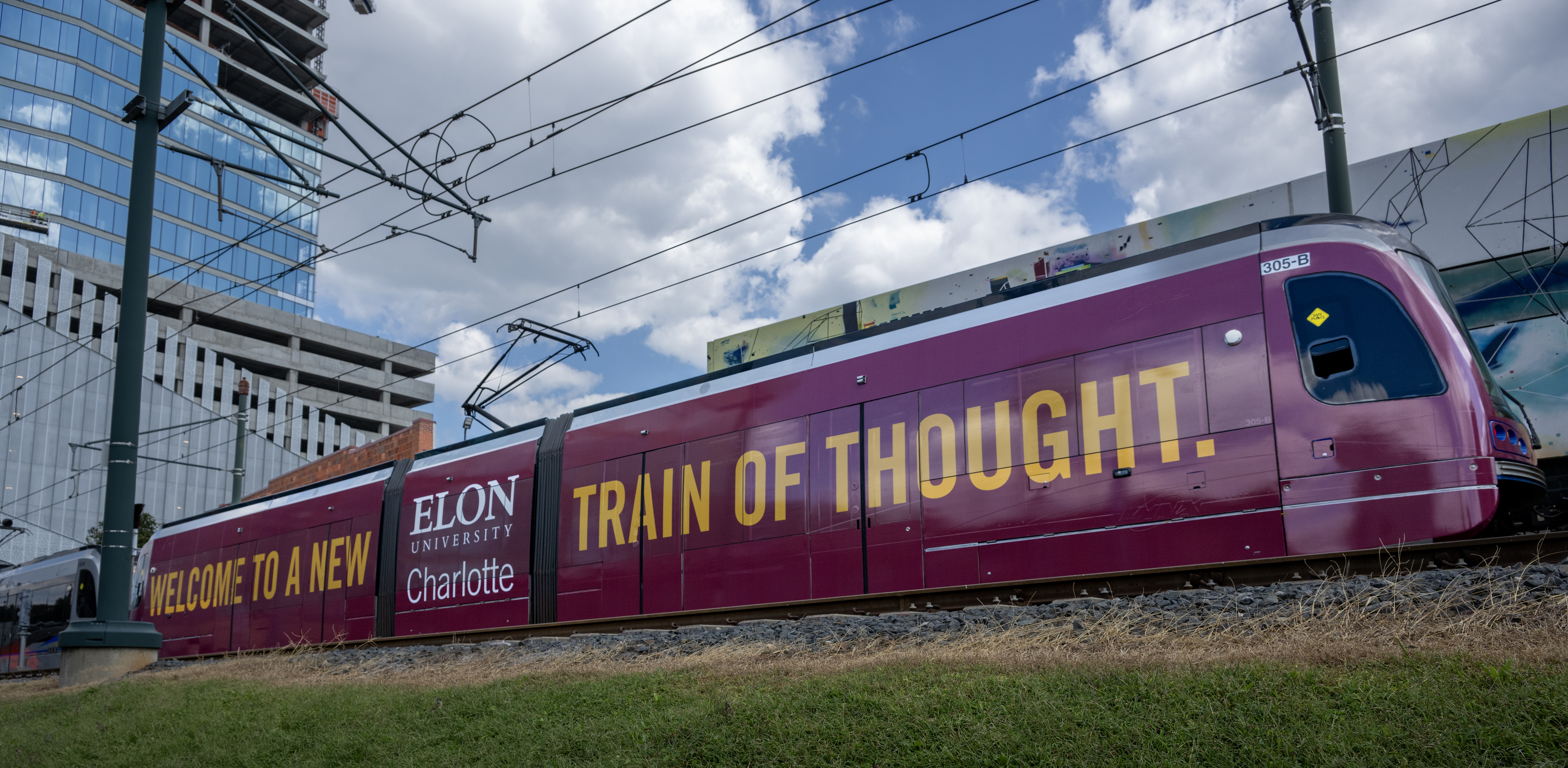 Charlotte light rail with "A train of thought" on side