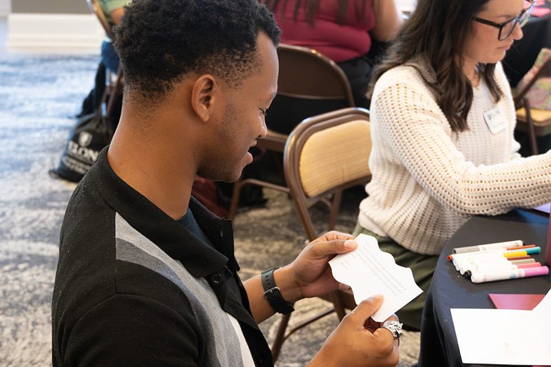 Elon MHE program student doing an activity
