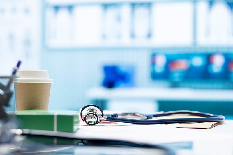 a clinic desk with a stethoscope