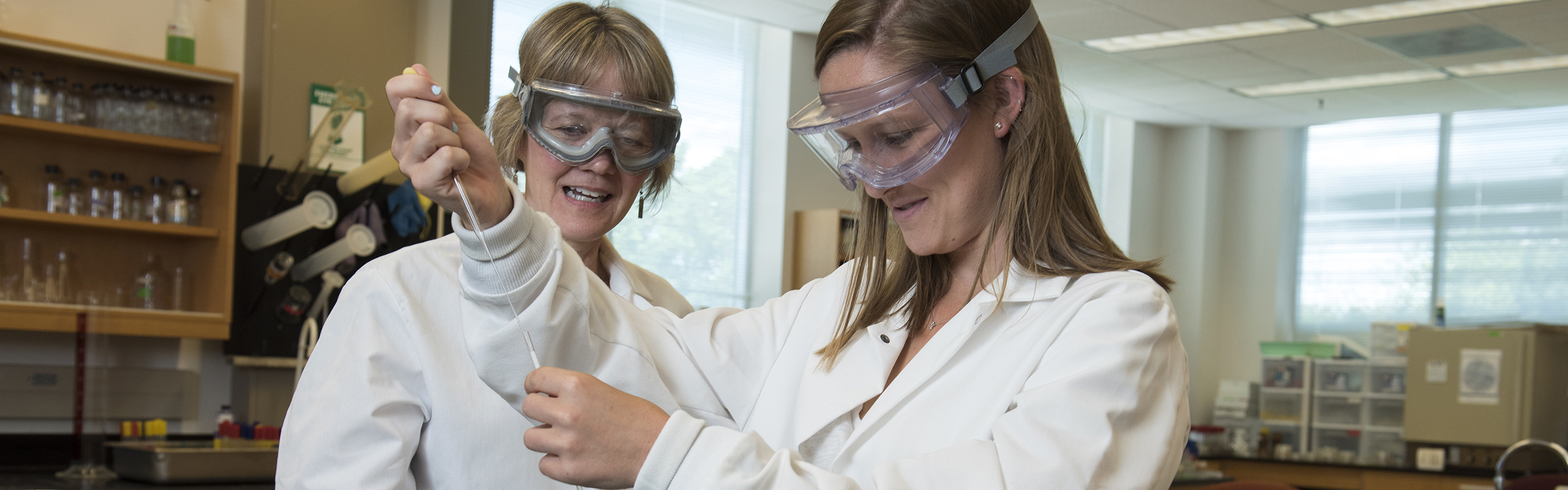 Associate Professor Kathy Matera with student in Chemistry lab