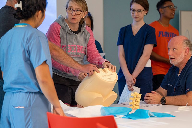 Elon physician assistant studies students in a lab