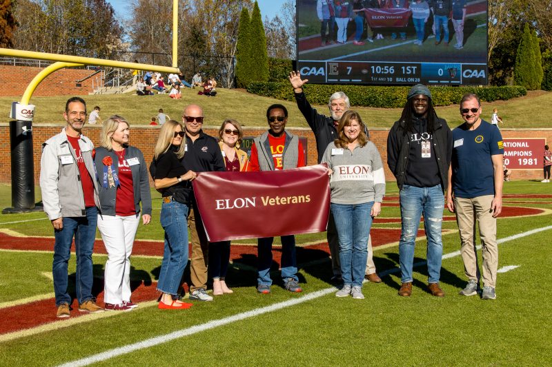 Members of the Veteran's Employee Resource Group are recognized on the football field