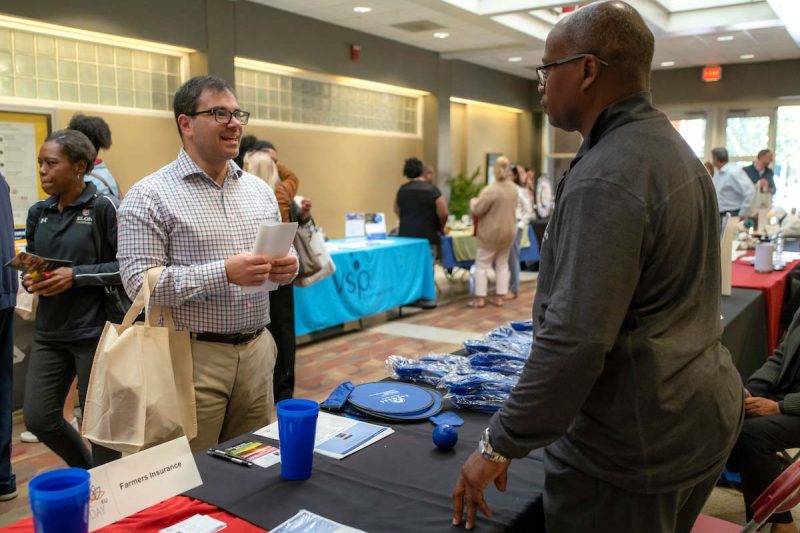 Photo of Elon staff at HealthEU fair