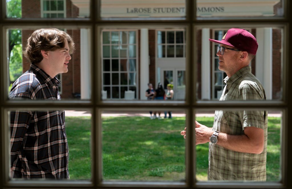 A photo of Lumen Scholar Jacob Hyle '22 with her mentor, Associate Professor Scott Morrison in the Dr. Jo Watts Williams School of Education at Elon University