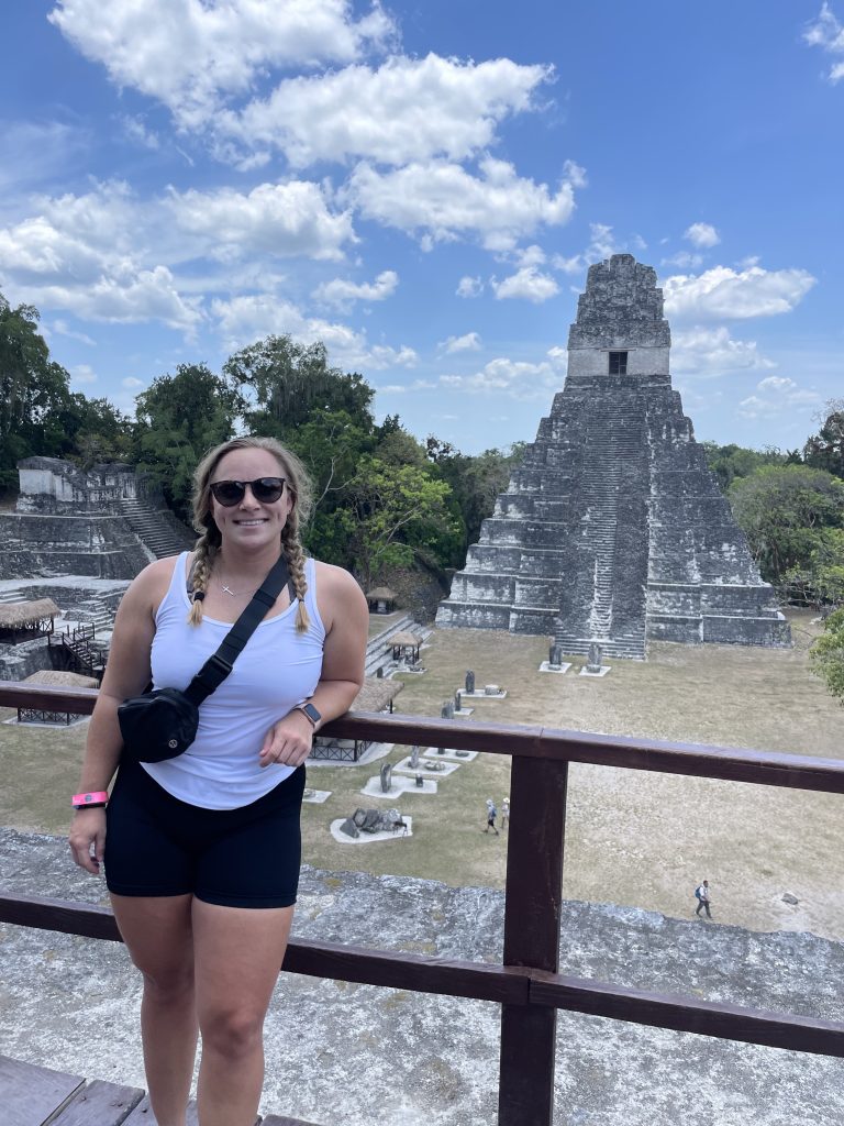 Elon University DPT graduate Alli Jackson standing in front of a historic site