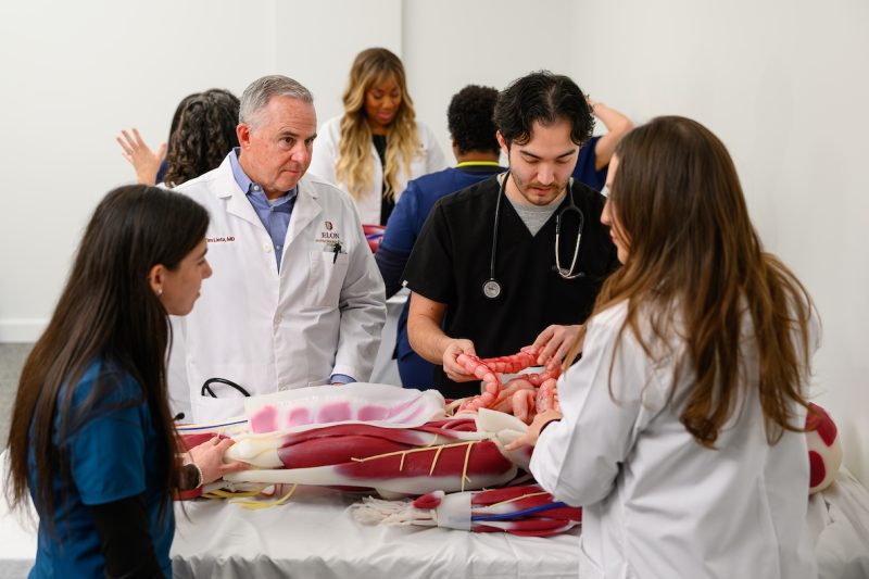 Elon PA facutly and students in a simulation lab