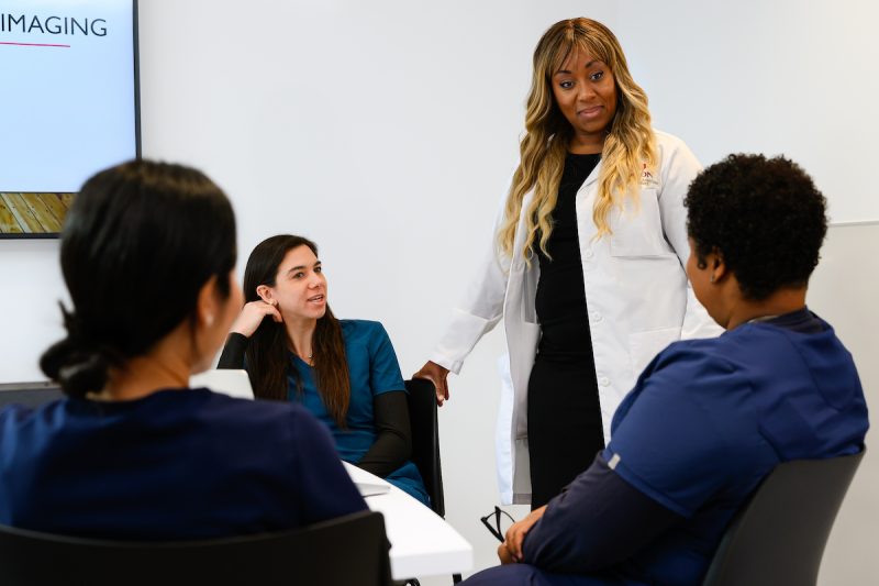 ������Ƶ PA program in Charlotte faculty talking to students