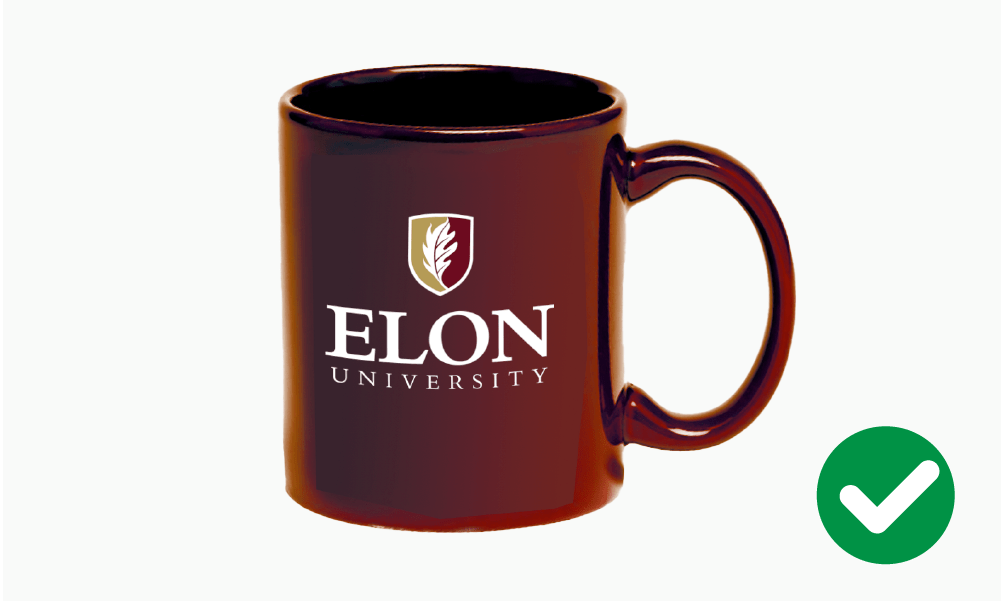 Correct Elon University logo placement on a maroon ceramic mug.