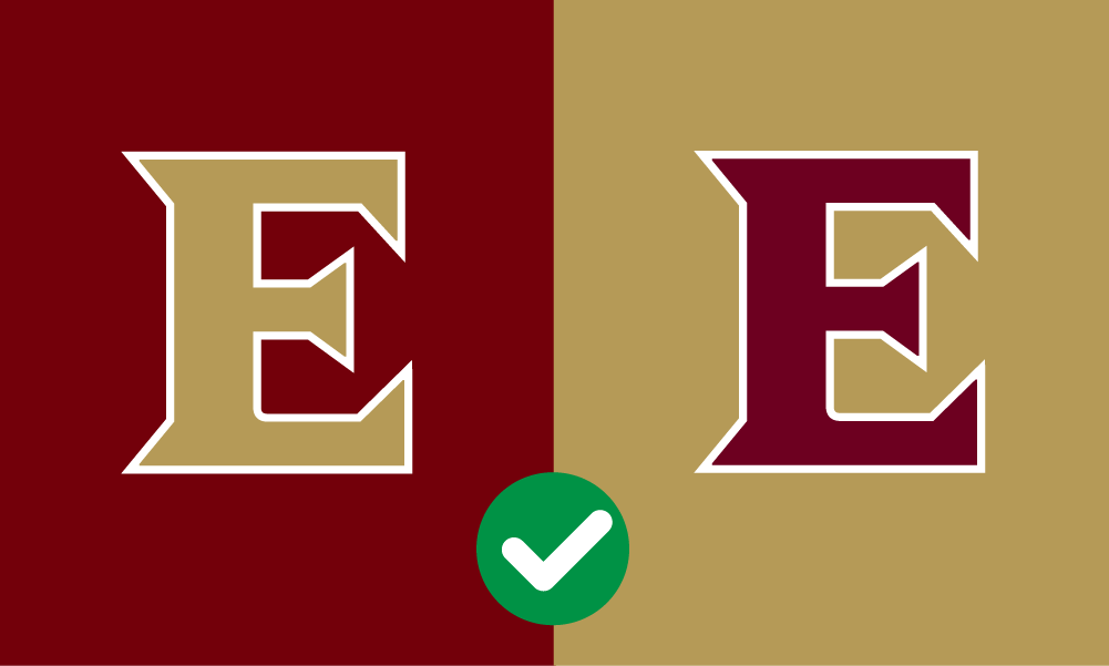 Correct usage example, showing to use the gold monogram on maroon, and the maroon monogram on gold backgrounds
