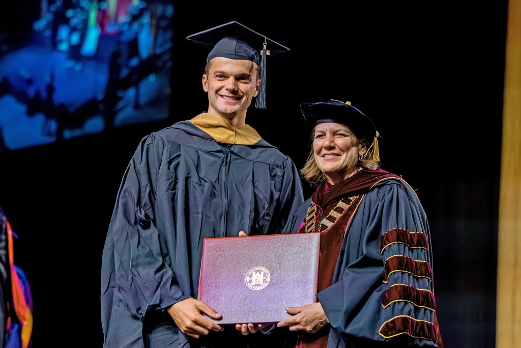 Images of Elon University's 2025 Master's ceremony on Wednesday, May 21 at Alumni Gym in Elon, N.C.