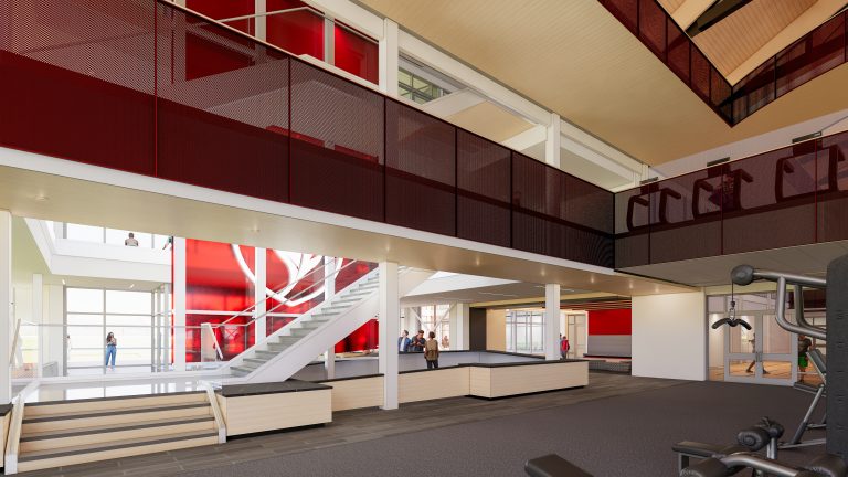 Architectural rendering of the Slattery Center atrium showing a multi-level open floor plan with a white staircase, red accent walls, mezzanine walkway, and fitness equipment.
