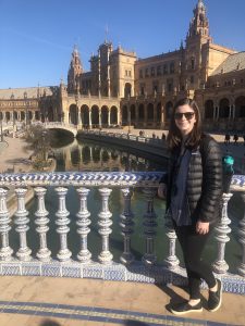 Nicole Plante posing in front of building. 
