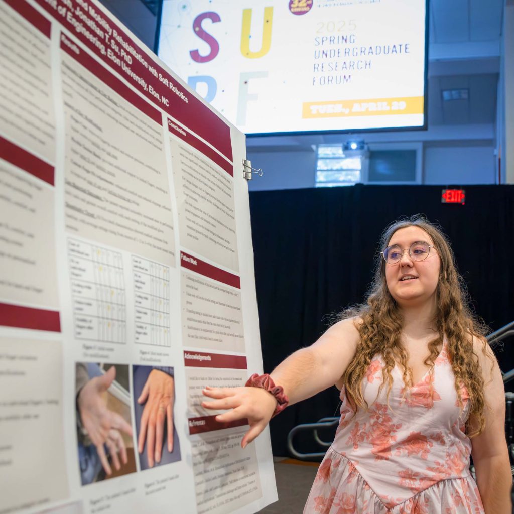 Cassidy Parrish presenting her research at the annual student undergraduate research forum