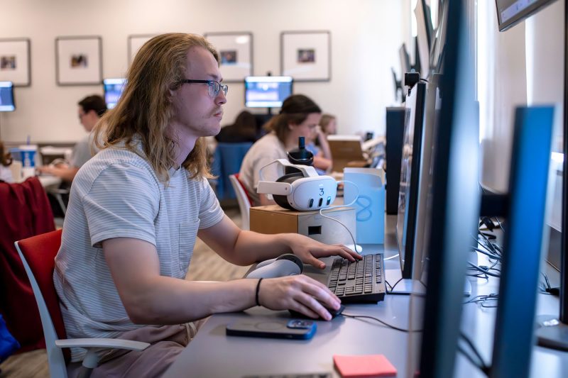 Student studying Computer Science in a VR lab in Duke Building