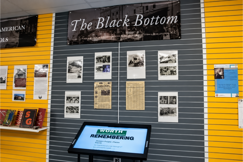 Museum wall display "The Black Bottom" and interactive screen: "Worth Remembering"