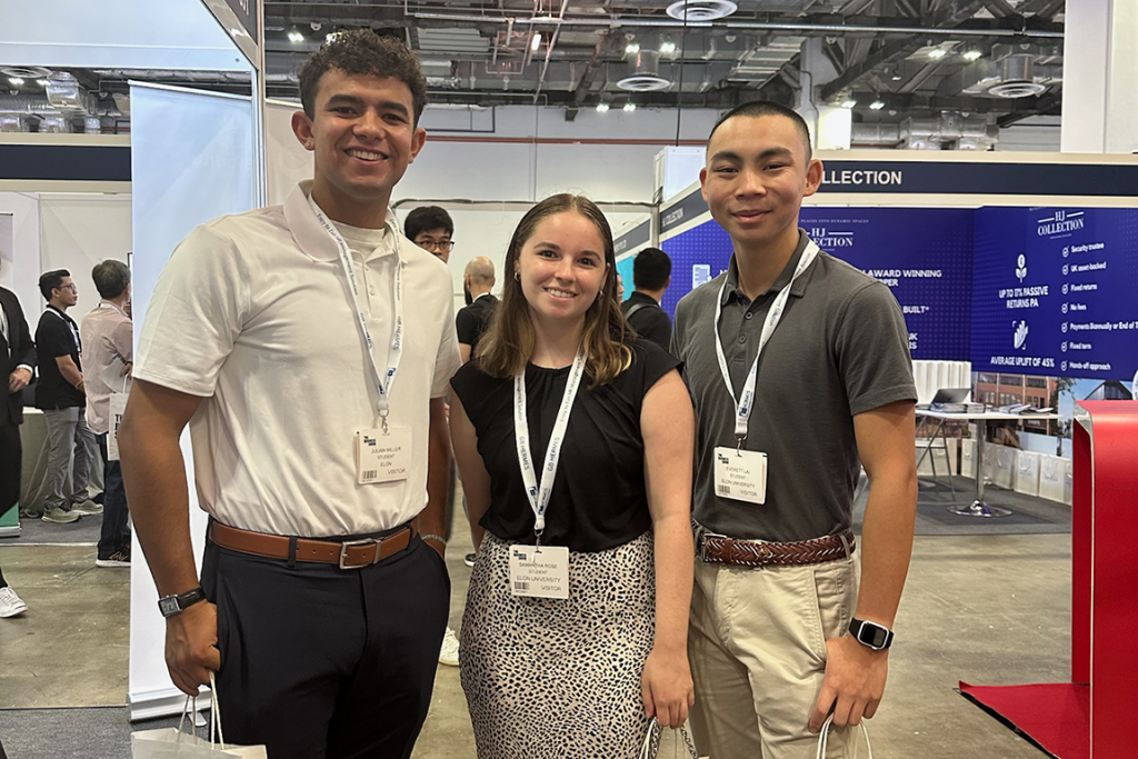 Three Elon students attend a professional event in Singapore.