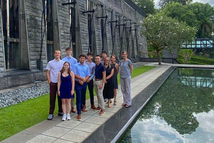 Elon students and faculty pose outside during a visit to the U.S. Embassy in Singapore.