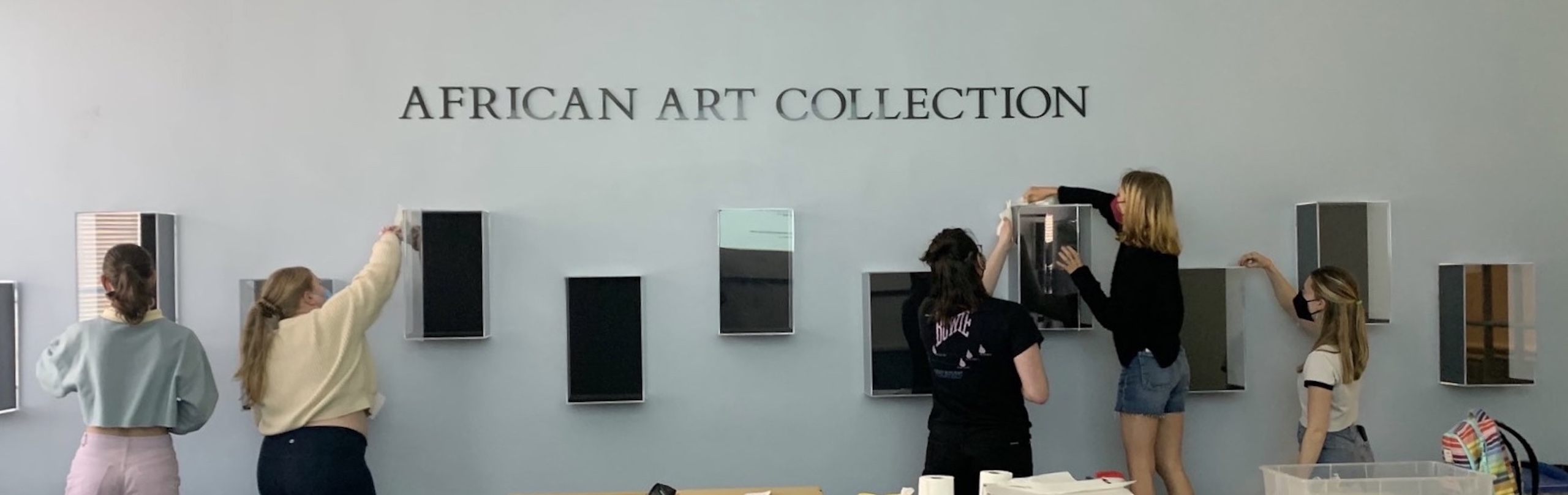 Students installing African art
