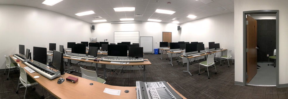 Wide shot of Elon's music production & technology facilities