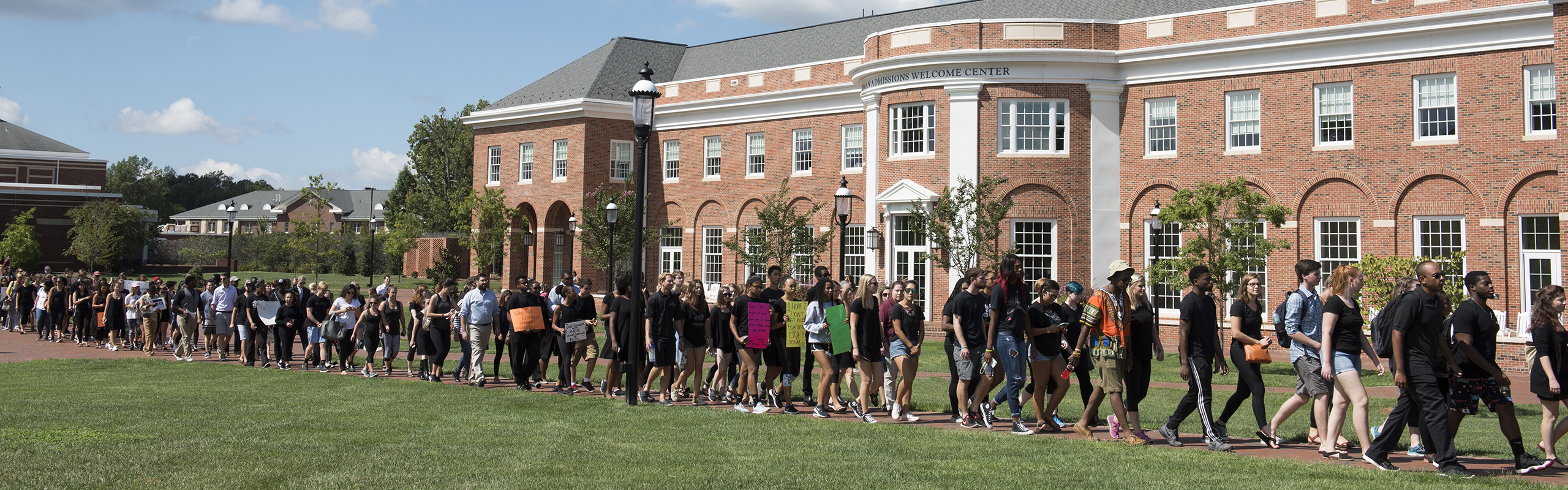 A gathering and march was organized by Elon's Black Student Union in response to the shooting deaths of two men in Tulsa and Charlotte. Hundreds of students, faculty and staff marched silently through the Elon University campus.