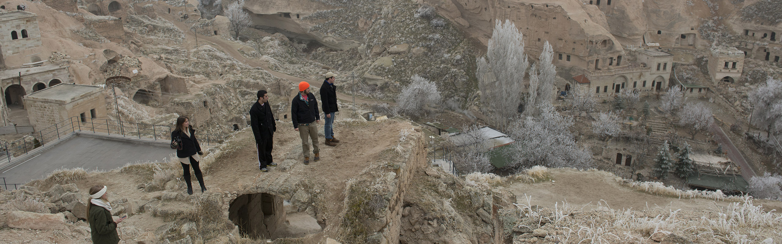 Elon students visit the Cappadocia region of central Turkey and explore abandoned cliff dwelling homes and structures.