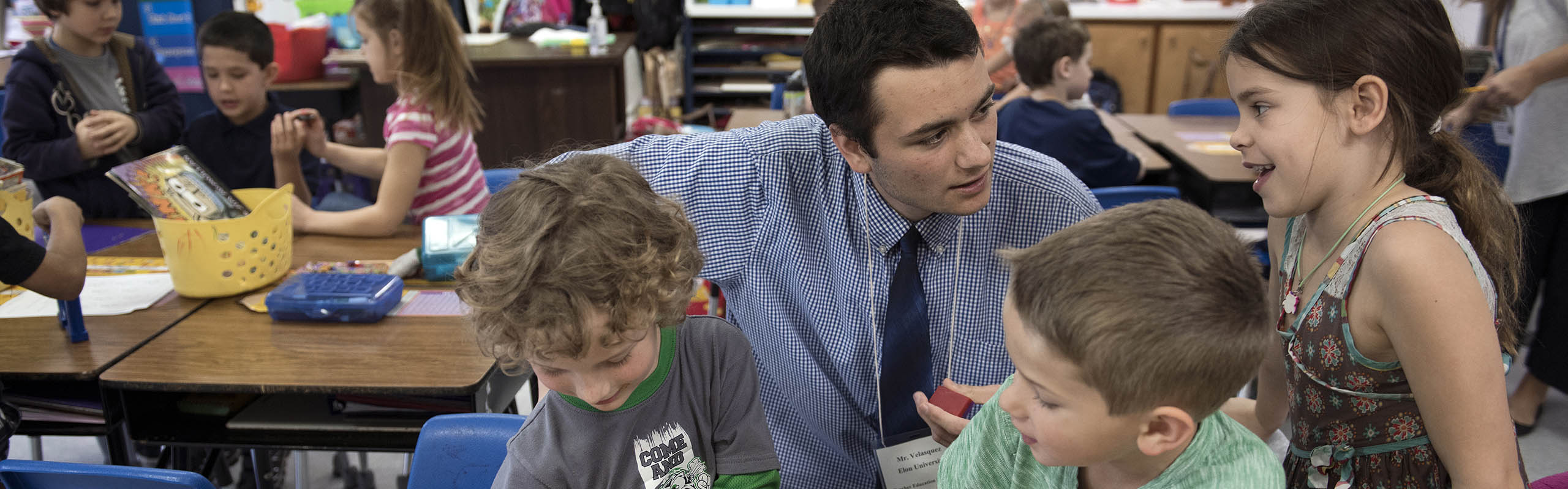 Tony Velasquez '17 works with his first grade class at Altamahaw Ossipee School, where he is student teaching.