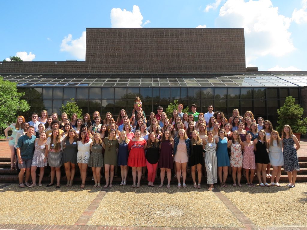 Elon Teaching Fellows Students standing in front of the center for performing arts