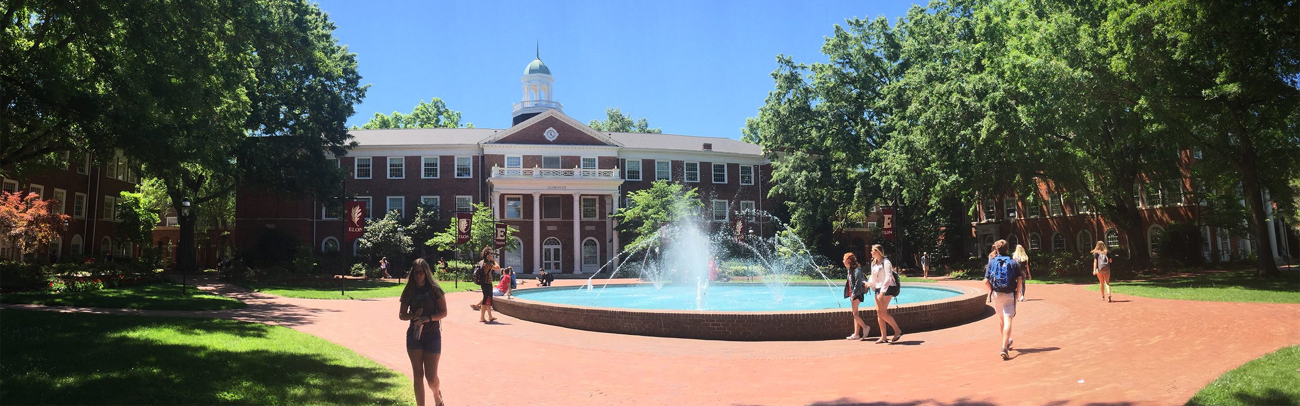 Students walking in front of Fonville fountain.
