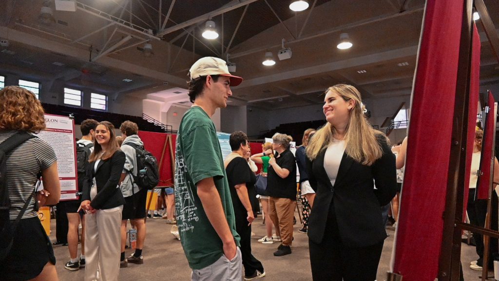 Student presenting research at SURF