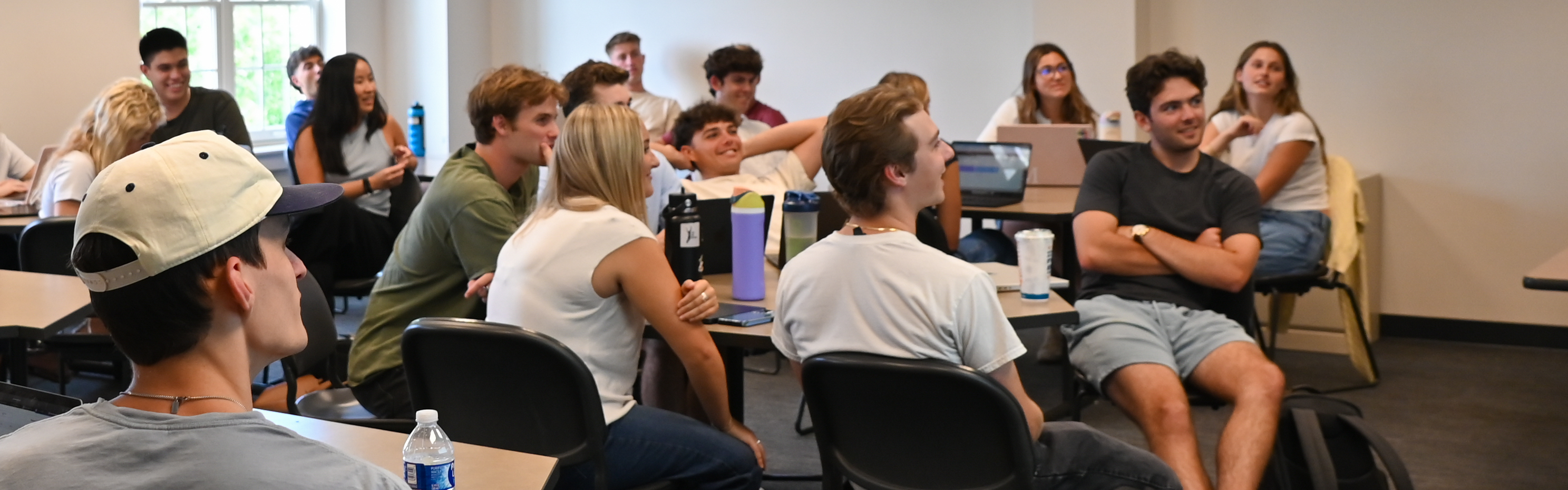 Photo of Love School of Business Students conversing in the classroom