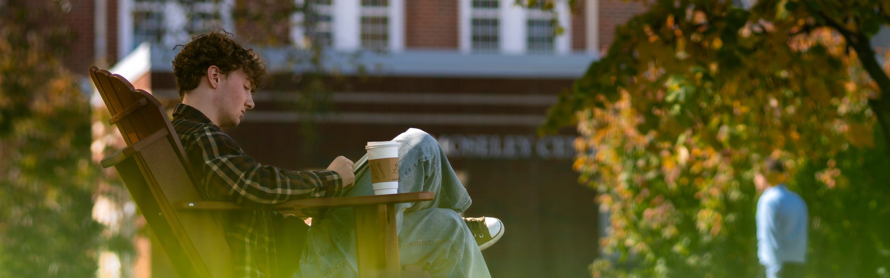 Photo of a student studying at Elon University