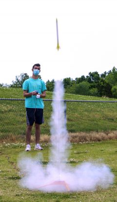 Success the second time: Andrew Weitz '23 launches his team's rocket.