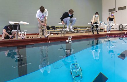 Assistant Professor of Engineering Will Pluer’s students participate and observe Thursday, Dec. 9, 2021, during the final exam for EGR 1210 at Beck Pool. The exam required students to build an underwater vehicle that would be used to perform several tasks in the pool during a timed session.