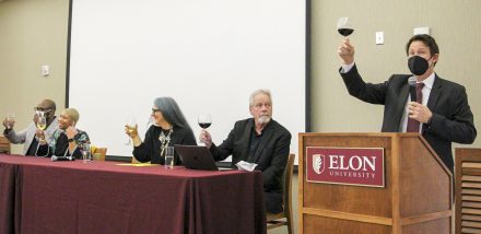 Tom Mould, former professor of anthropology, leads a toast to the Center for Study of Religion, Culture and Society's first 10 years.