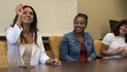 Left to right, students Nazaneen Shokri ’24, Mia Wilson ’22, and Deena Elrefai ’22 discuss their research with the H.E.R. Lab, Monday, April 11, 2022 at Elon University. (Rob Brown photo)