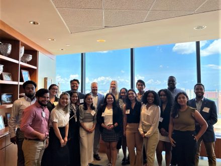 Dave Porter P'11 P'19, Elon University Board of Trustees Chair, meets Odyssey Program students in Baystate Financial's Boston office.